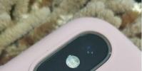 手機教程:iPhoneXS后置攝像頭上面的小孔是干嘛的?