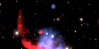 天文學家看到年輕宇宙中星系團的巨大碰撞