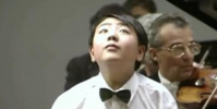 13歲的郎朗和現在一模一樣